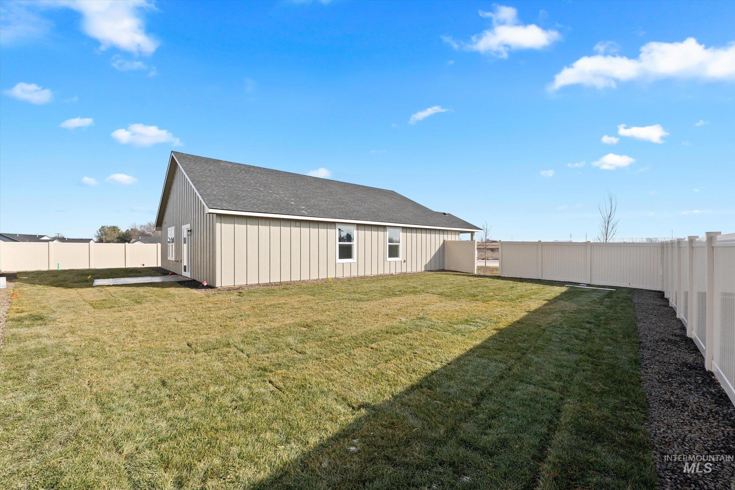1142 Velvet Loop Wilder, ID 83676 - Photo 23 of 27 Rear view of property featuring a fenced backyard
