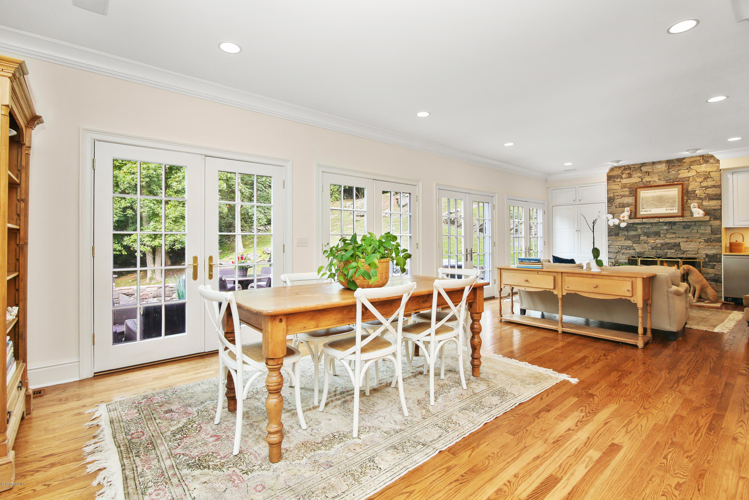 82 Round Hill Road Greenwich, CT 06831 - Photo 12 of 19 a view of a dining room with furniture and wooden floor
