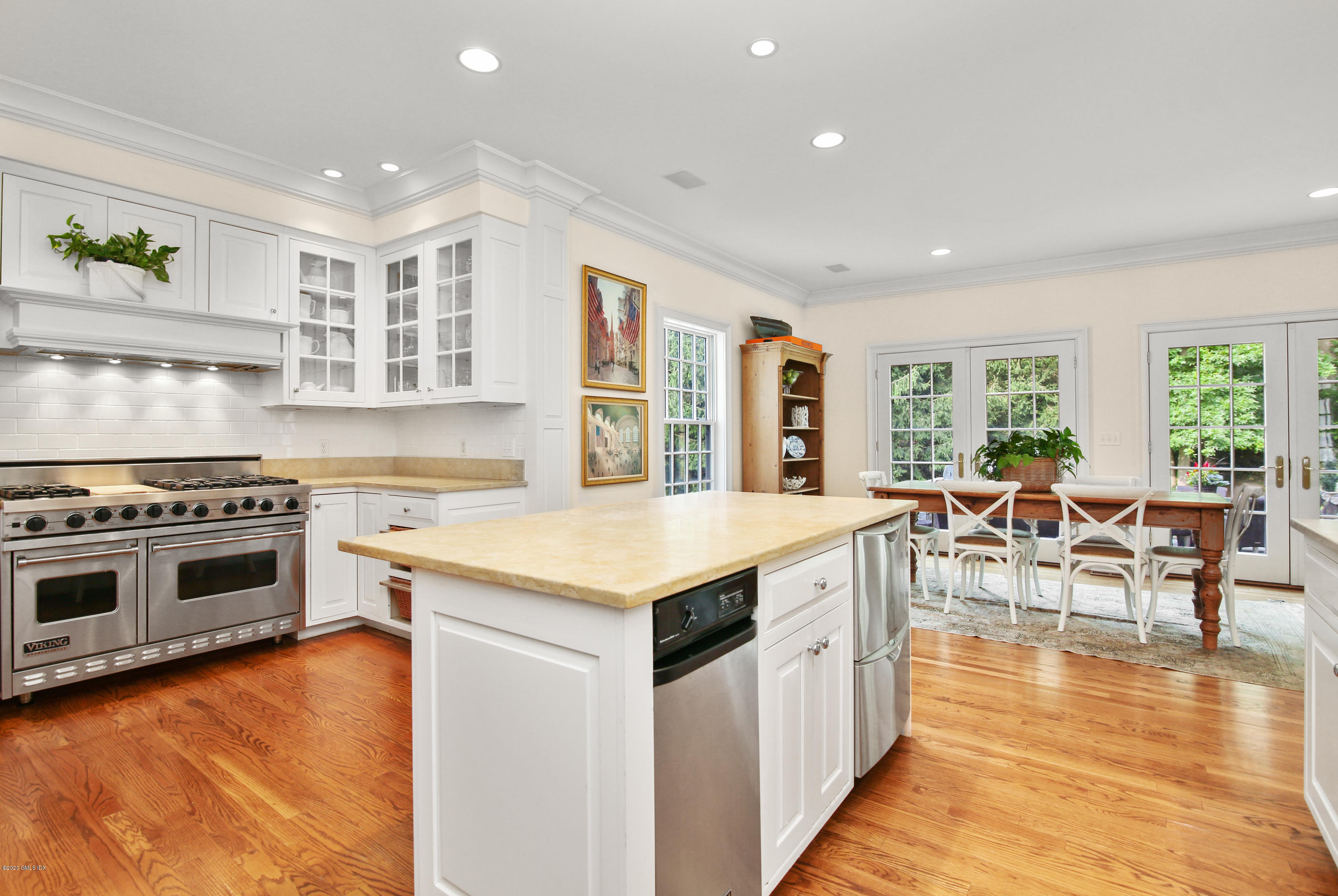 82 Round Hill Road Greenwich, CT 06831 - Photo 14 of 19 a open kitchen with stainless steel appliances granite countertop a stove and cabinets