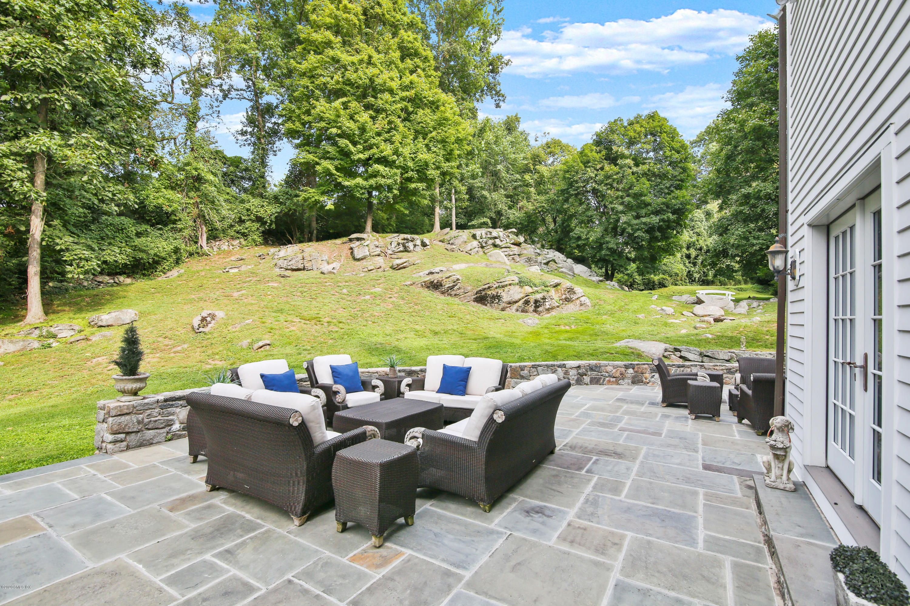 82 Round Hill Road Greenwich, CT 06831 - Photo 15 of 19 a view of a patio with swimming pool