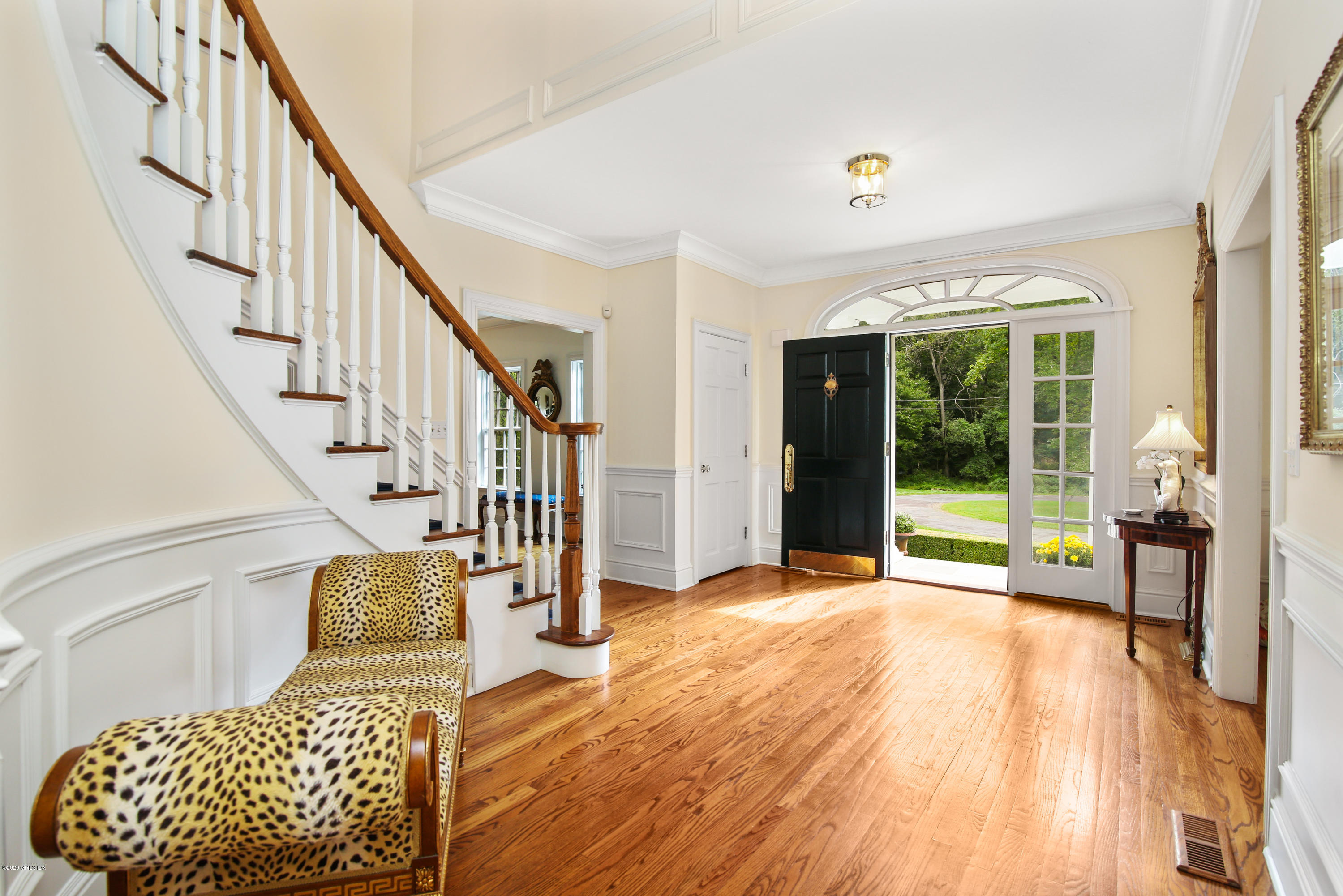 82 Round Hill Road Greenwich, CT 06831 - Photo 5 of 19 a view of an entryway with wooden floor