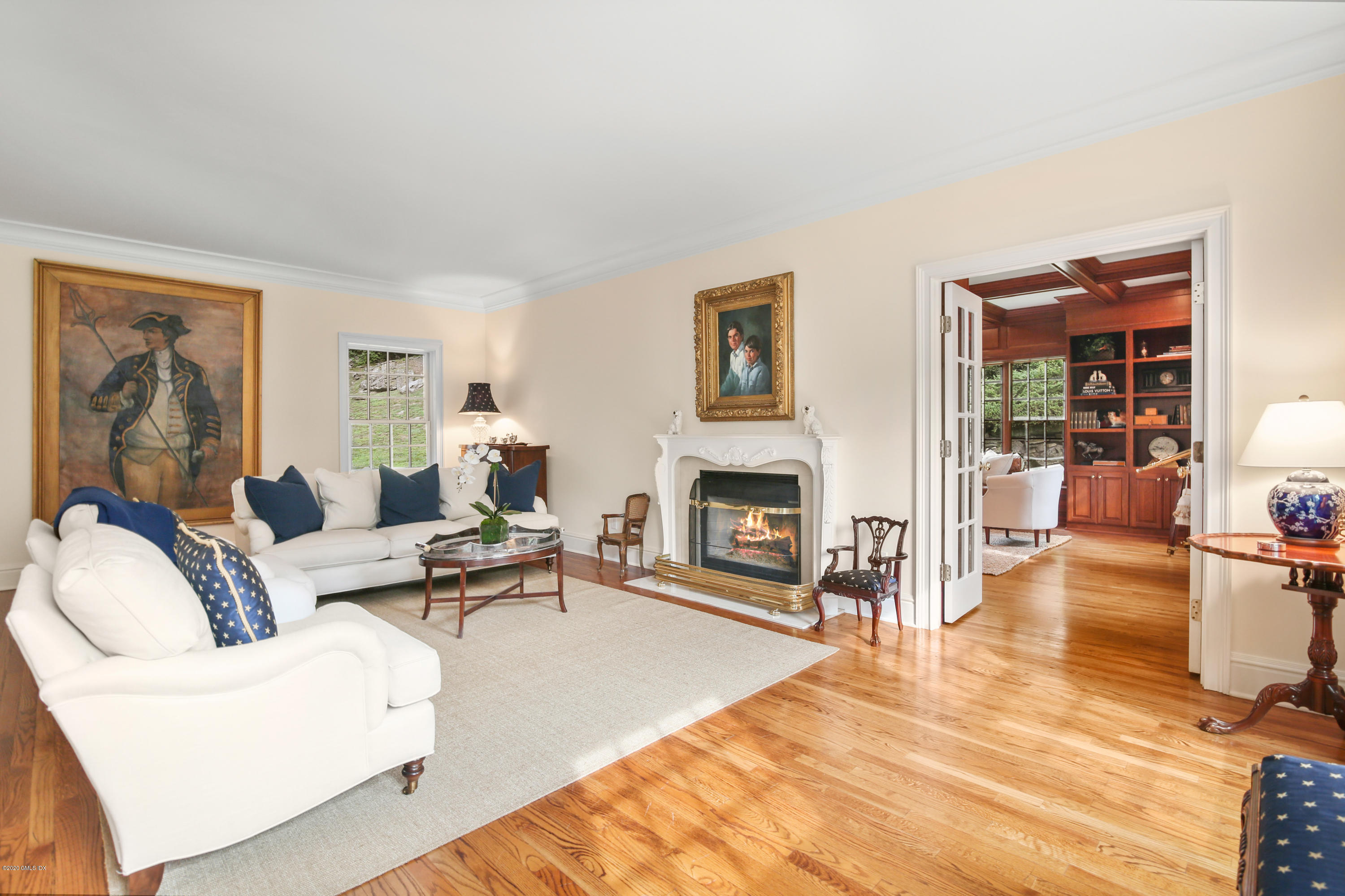 82 Round Hill Road Greenwich, CT 06831 - Photo 7 of 19 a living room with furniture and a fireplace