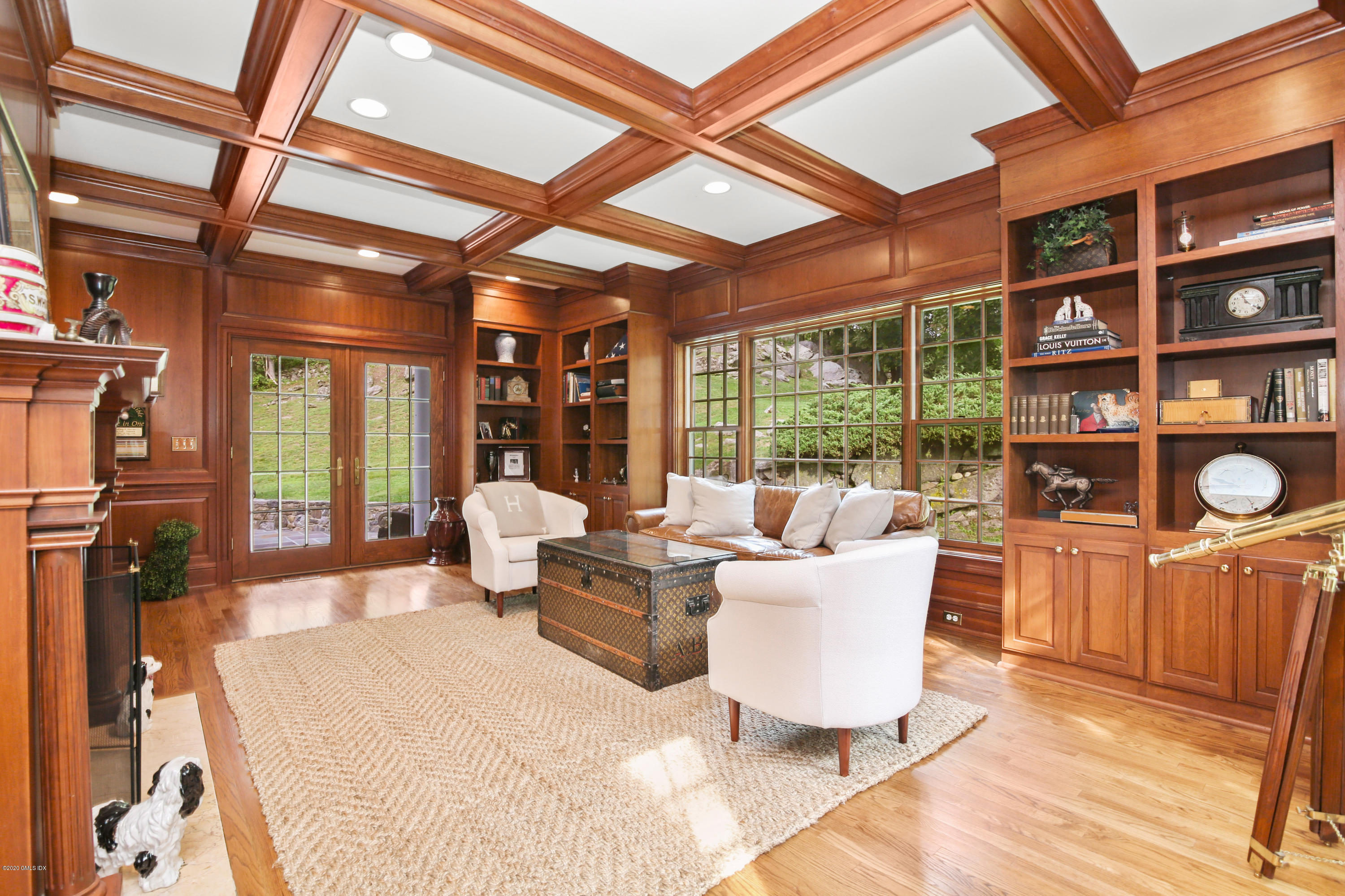 82 Round Hill Road Greenwich, CT 06831 - Photo 8 of 19 a living room with furniture and a floor to ceiling window