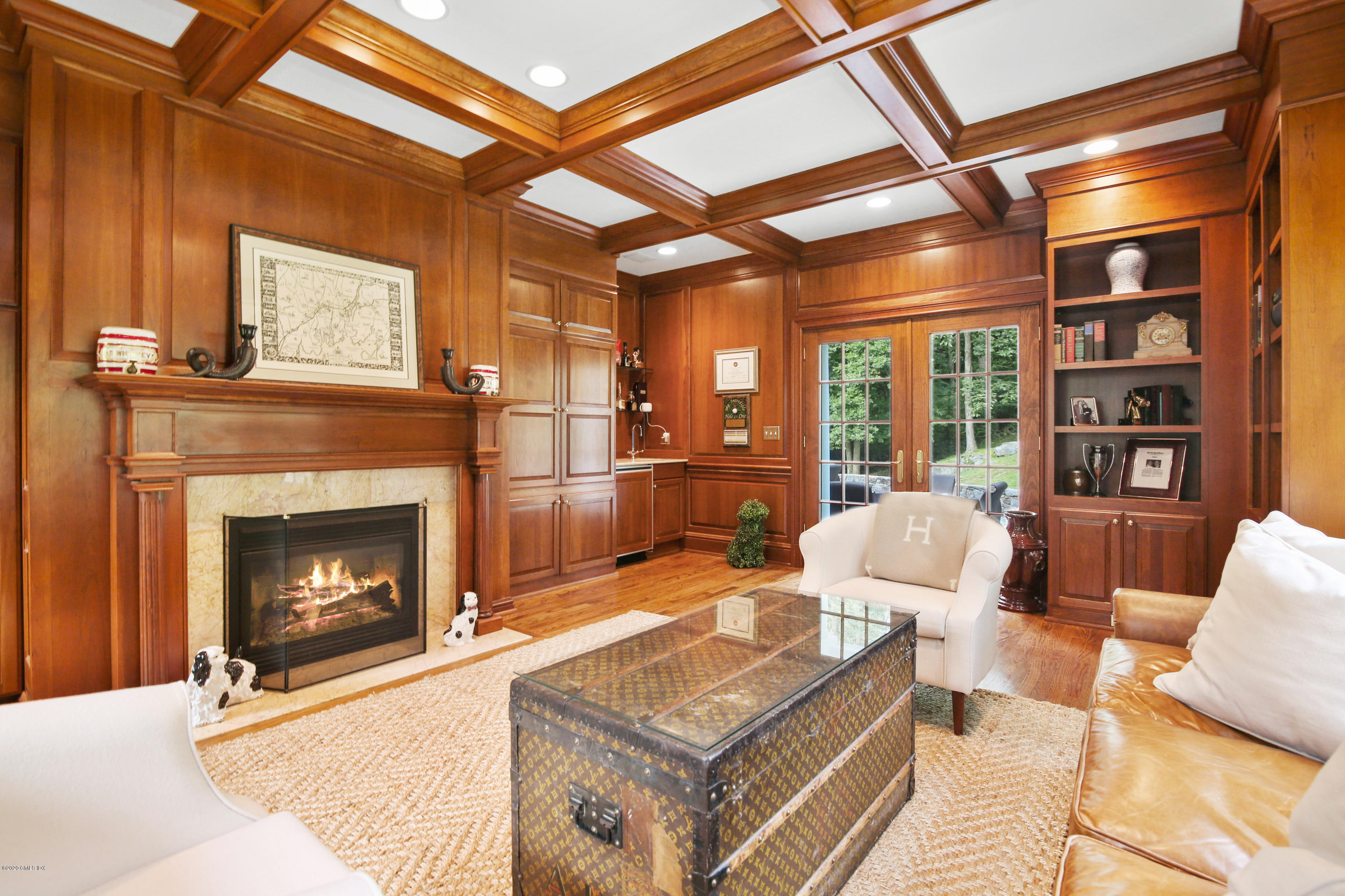 82 Round Hill Road Greenwich, CT 06831 - Photo 9 of 19 a living room with furniture and a fireplace