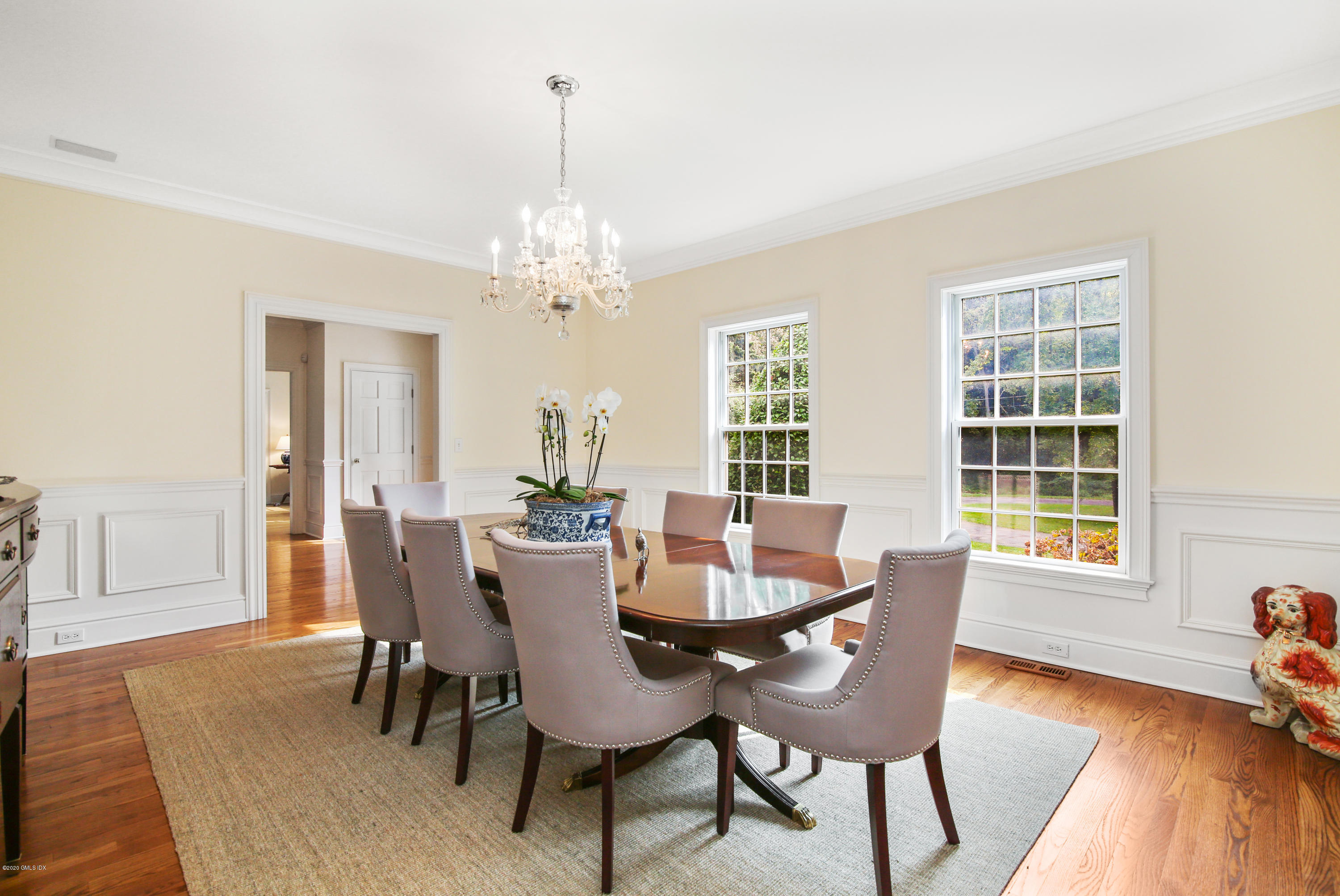 82 Round Hill Road Greenwich, CT 06831 - Photo 10 of 19 a view of a dining room with furniture windows and wooden floor