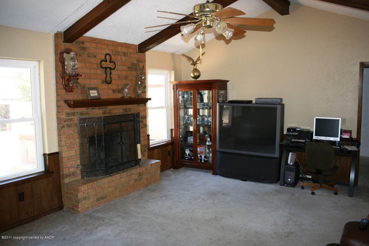 2826 Lloyd Drive Amarillo, TX 79110 - Photo 4 of 18 a view of a livingroom with furniture and a fireplace