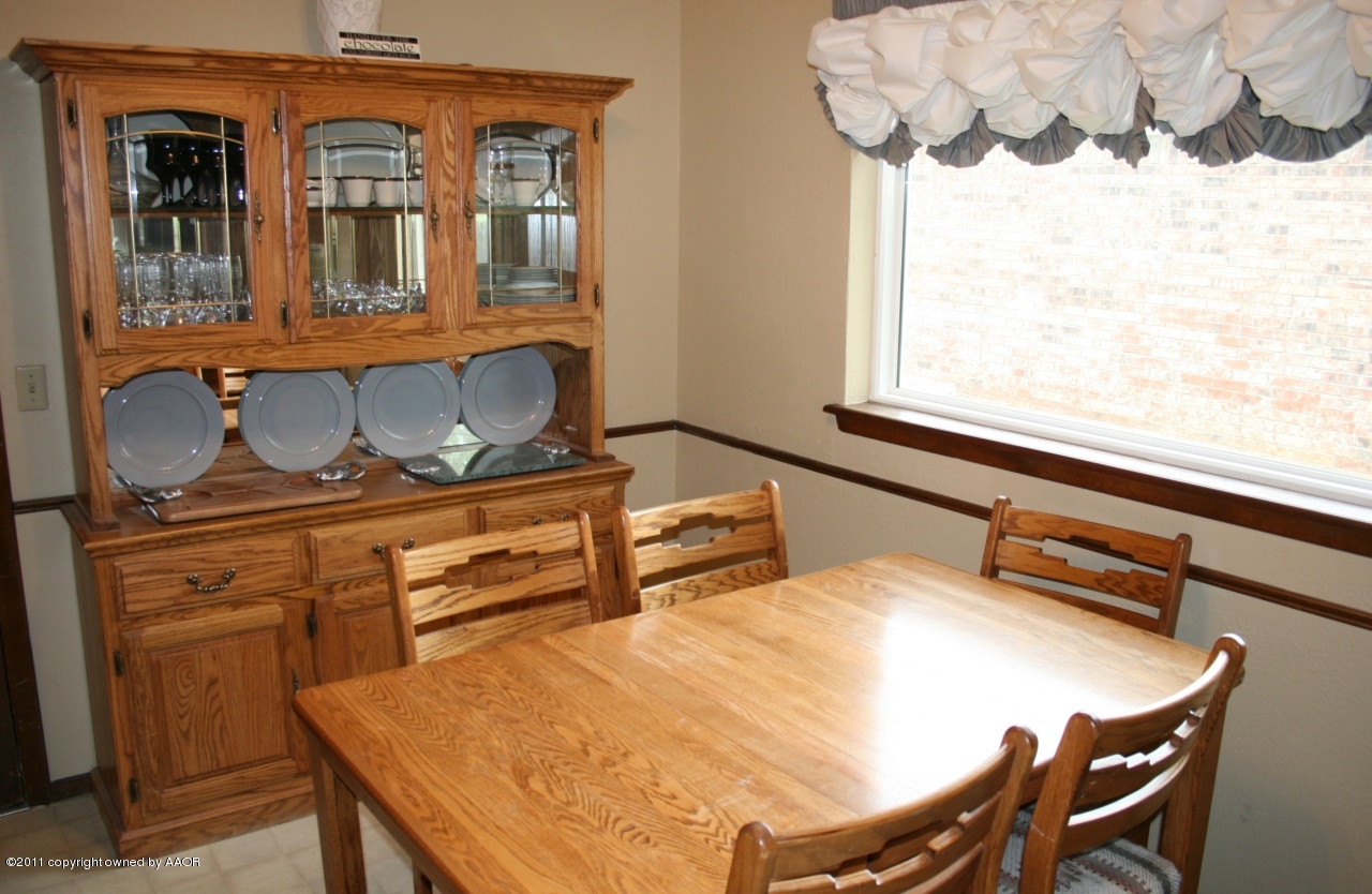 2826 Lloyd Drive Amarillo, TX 79110 - Photo 6 of 18 a bedroom with a bed and ceiling fan