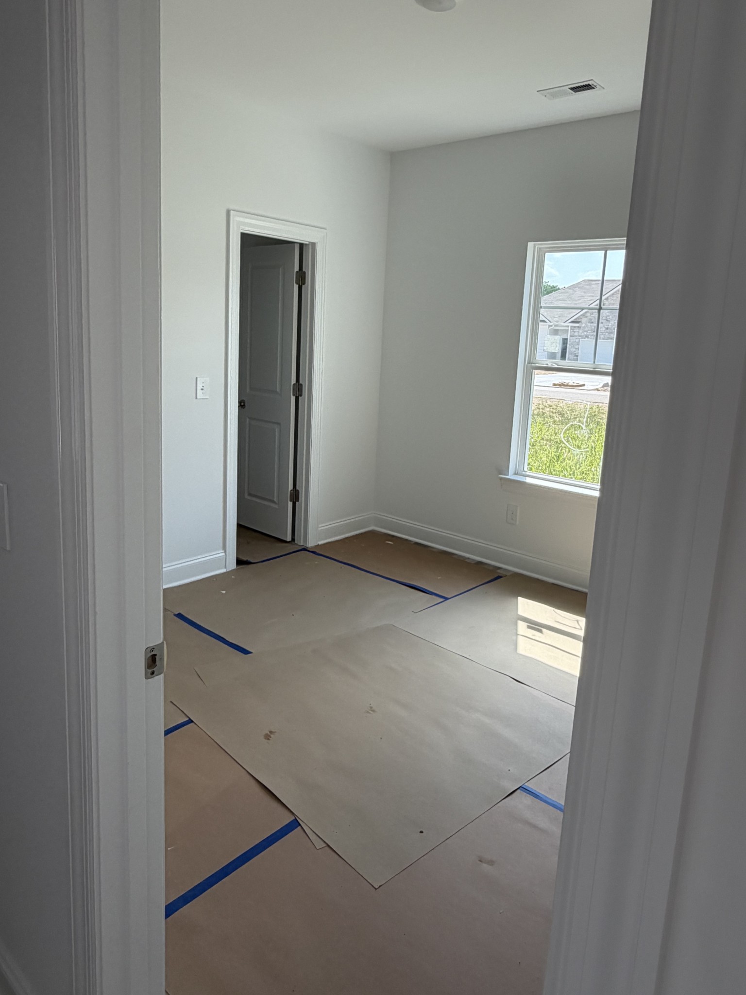 1209 Euclid Murfreesboro, TN 37127 - Photo 13 of 14 a view of an empty room with a window and closet area