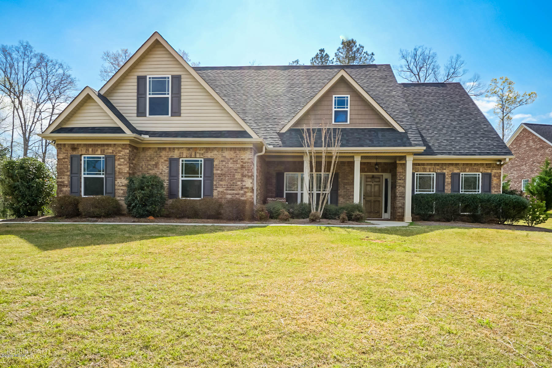 125 Rivers Edge Drive Forsyth, GA 31029 - Photo 1 of 21 a front view of a house with a yard