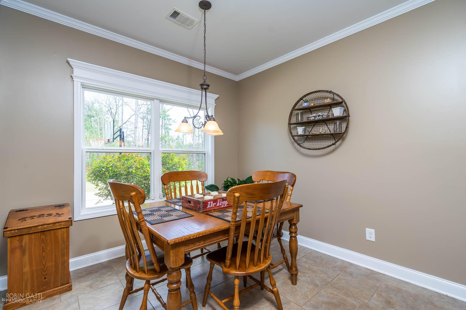 125 Rivers Edge Drive Forsyth, GA 31029 - Photo 9 of 21 a view of a dining room with furniture window and outside view