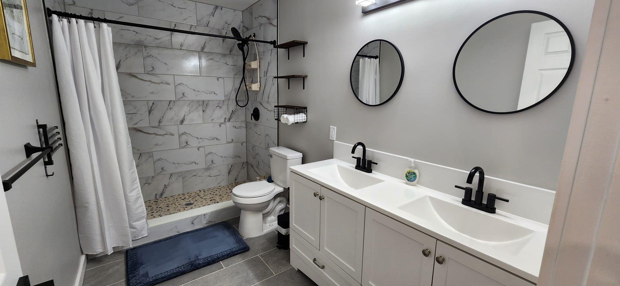 5200 Choctaw Street St. Augustine, FL 32092 - Photo 11 of 29 a bathroom with a toilet a sink and a mirror