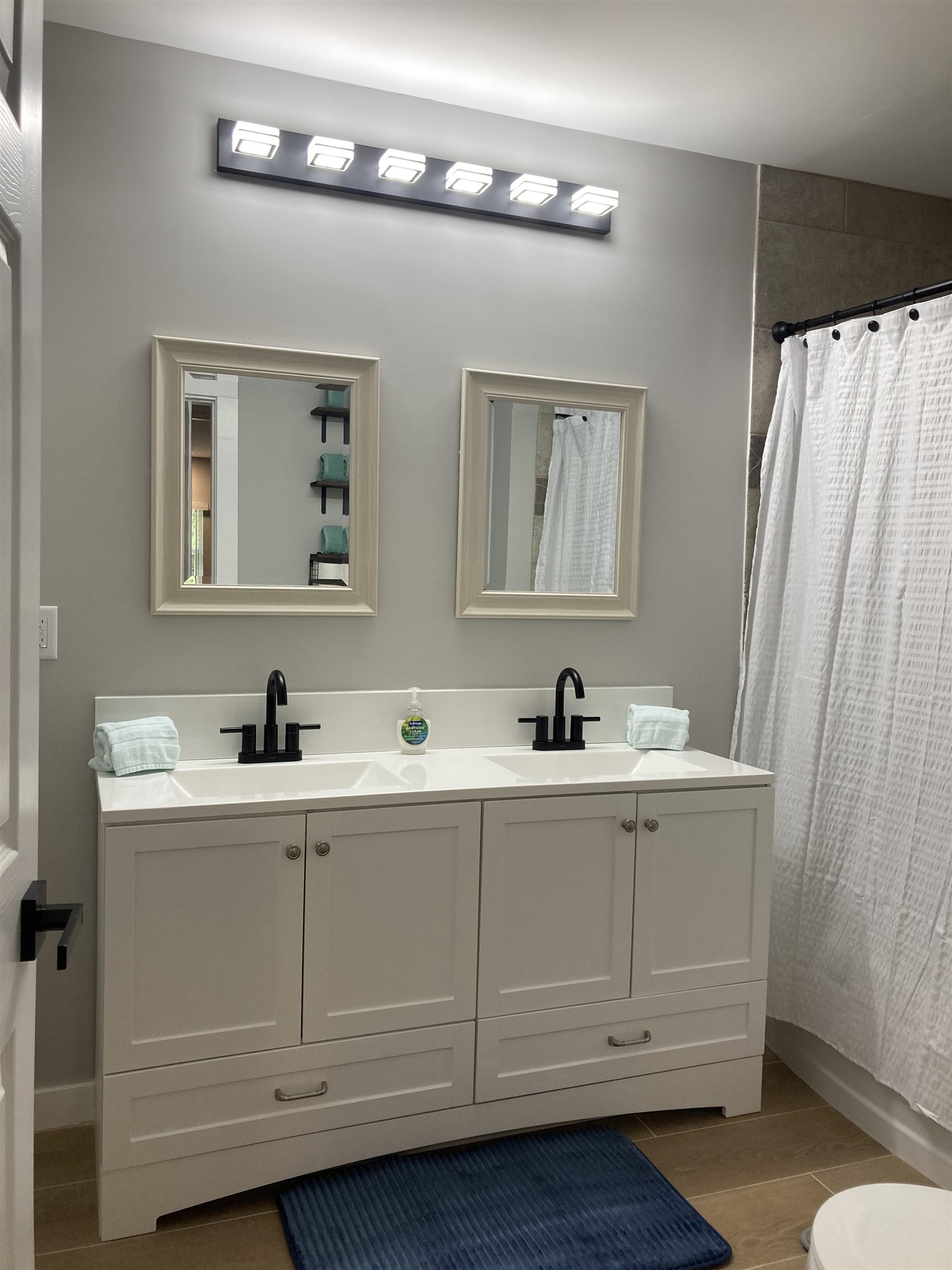 5200 Choctaw Street St. Augustine, FL 32092 - Photo 14 of 29 a bathroom with a sink and a mirror