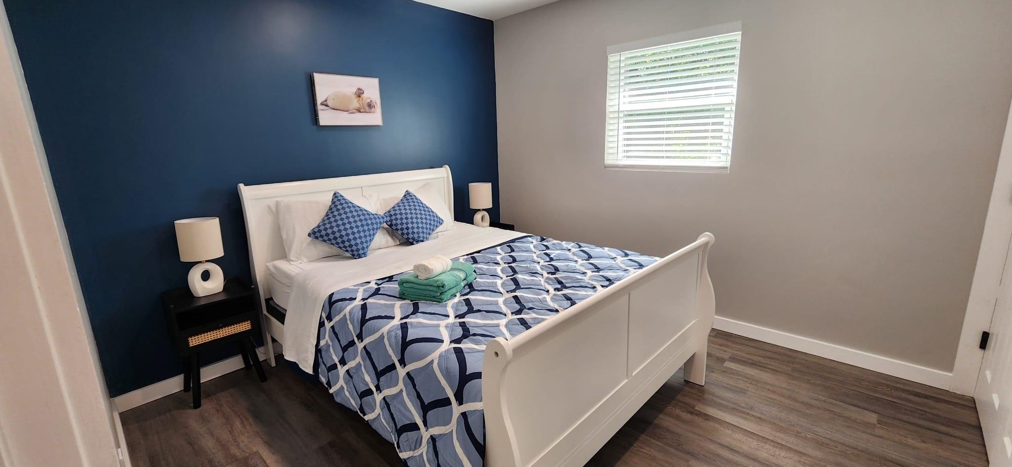 5200 Choctaw Street St. Augustine, FL 32092 - Photo 17 of 29 a bedroom with a bed and wooden floor