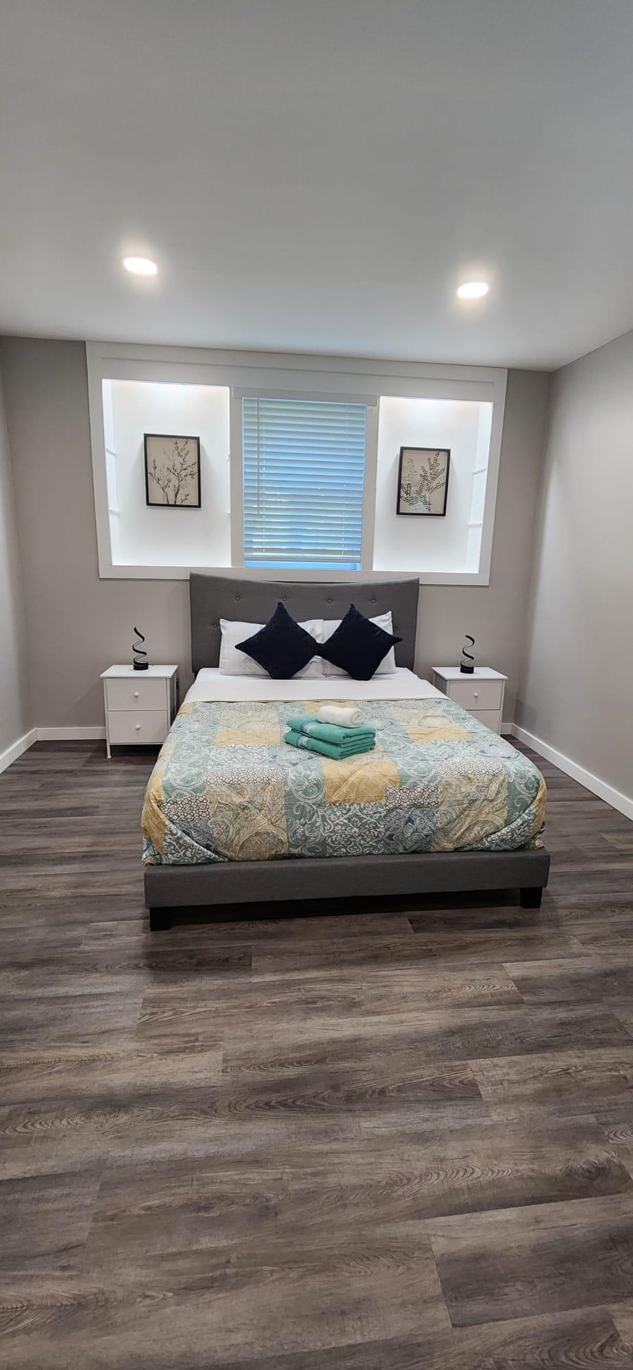 5200 Choctaw Street St. Augustine, FL 32092 - Photo 20 of 29 a bedroom with a bed and a painting on the wall