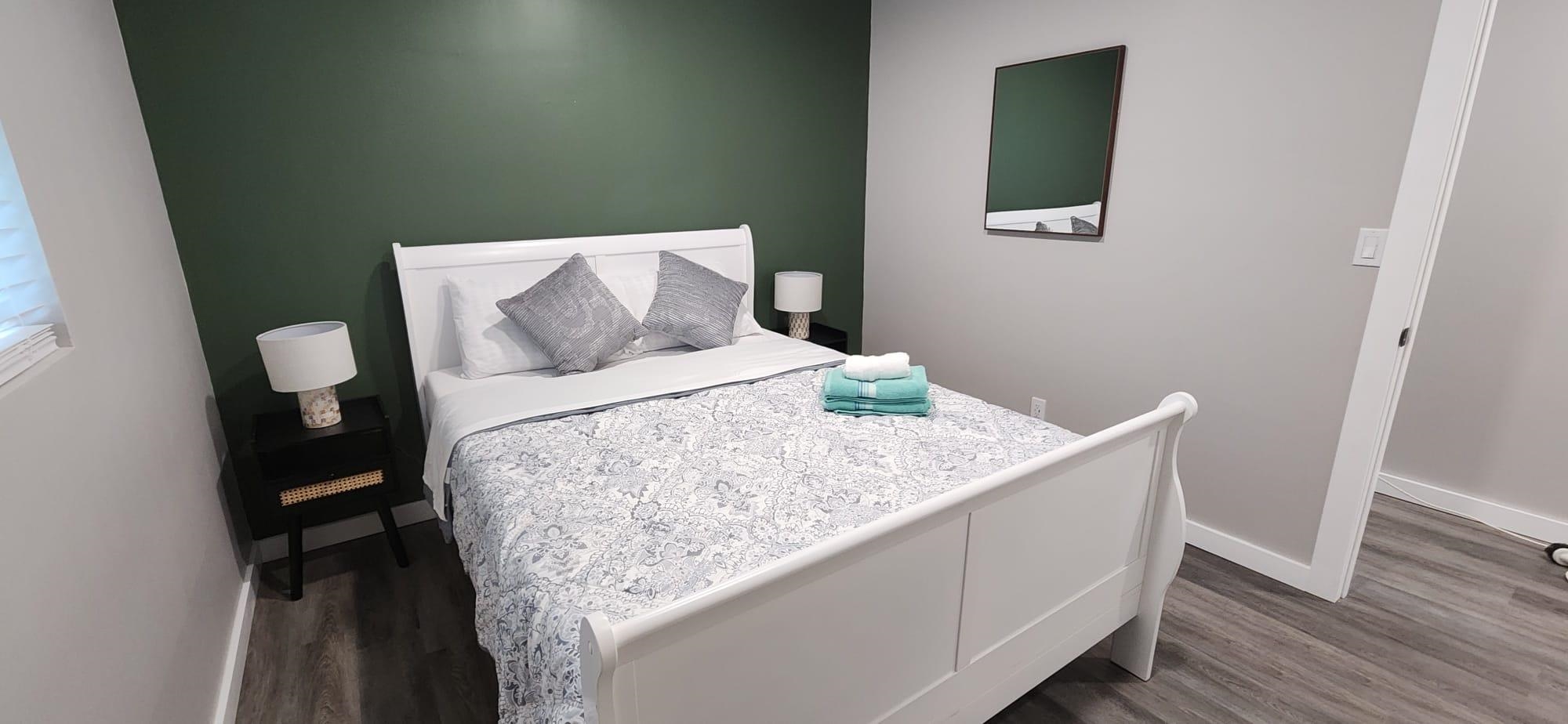 5200 Choctaw Street St. Augustine, FL 32092 - Photo 23 of 29 a bedroom with a bed and wooden floor