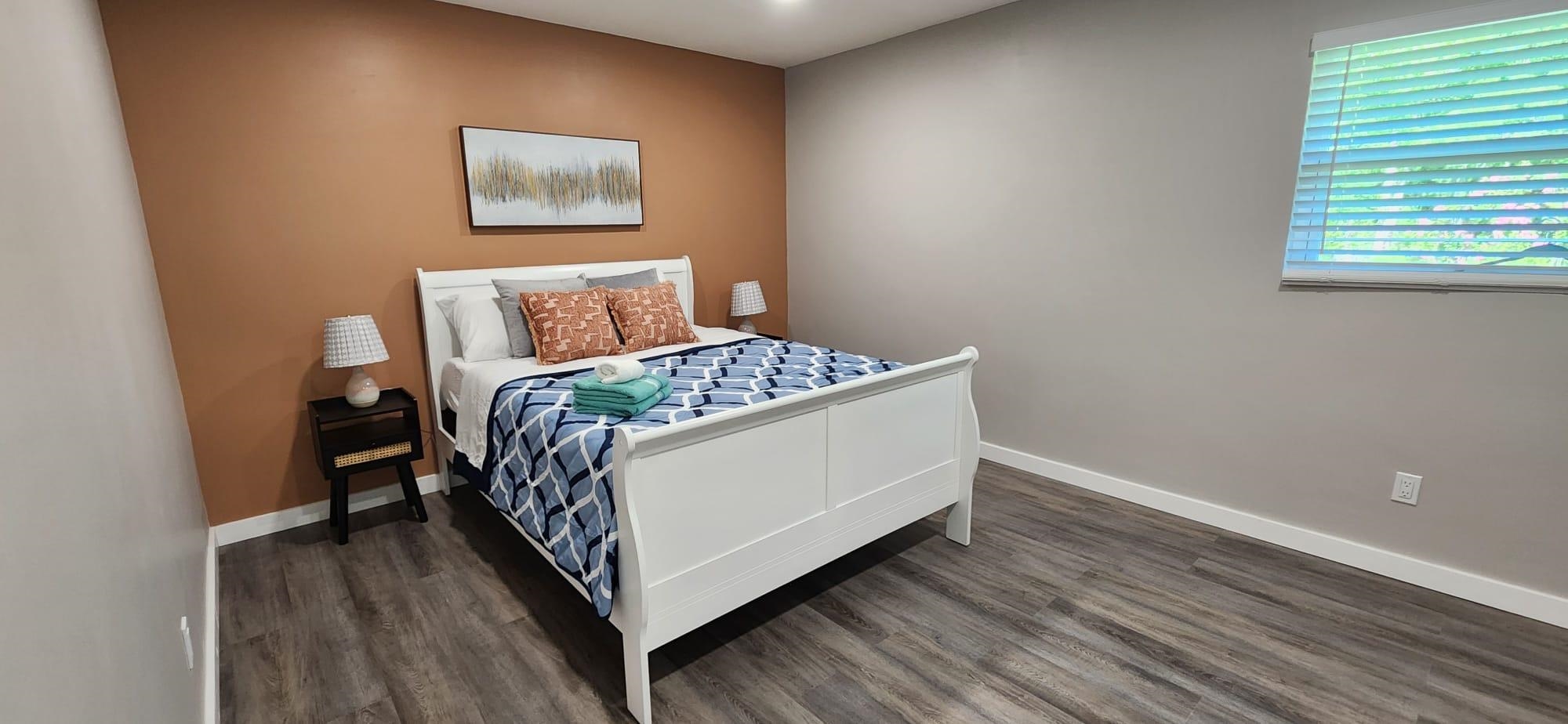 5200 Choctaw Street St. Augustine, FL 32092 - Photo 24 of 29 a bed sitting in a bedroom next to a window