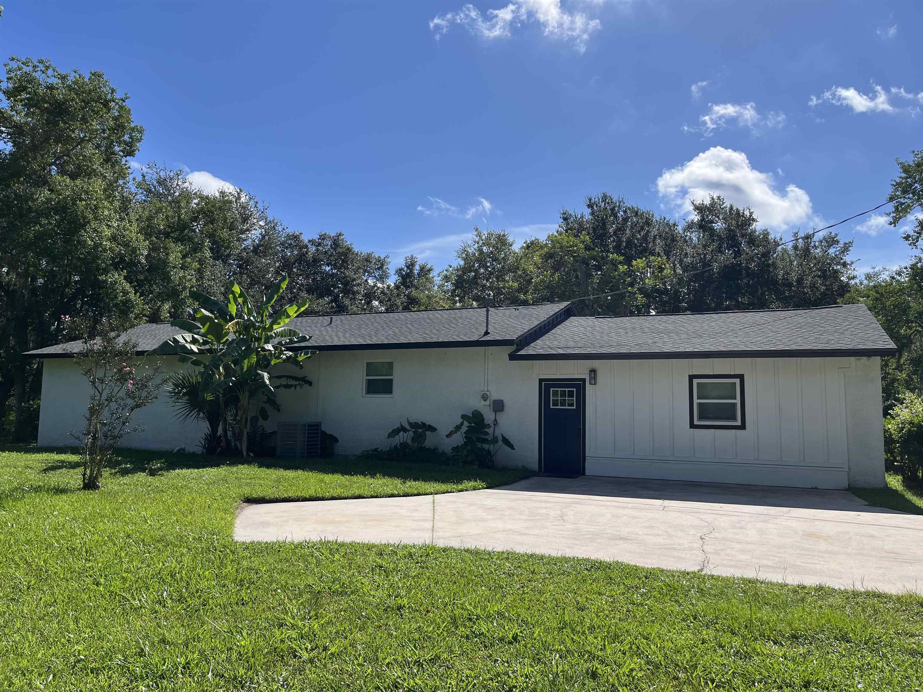 5200 Choctaw Street St. Augustine, FL 32092 - Photo 3 of 29 a house view with a backyard space