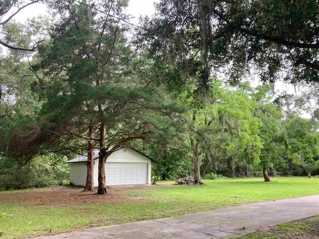 a house view with a garden space