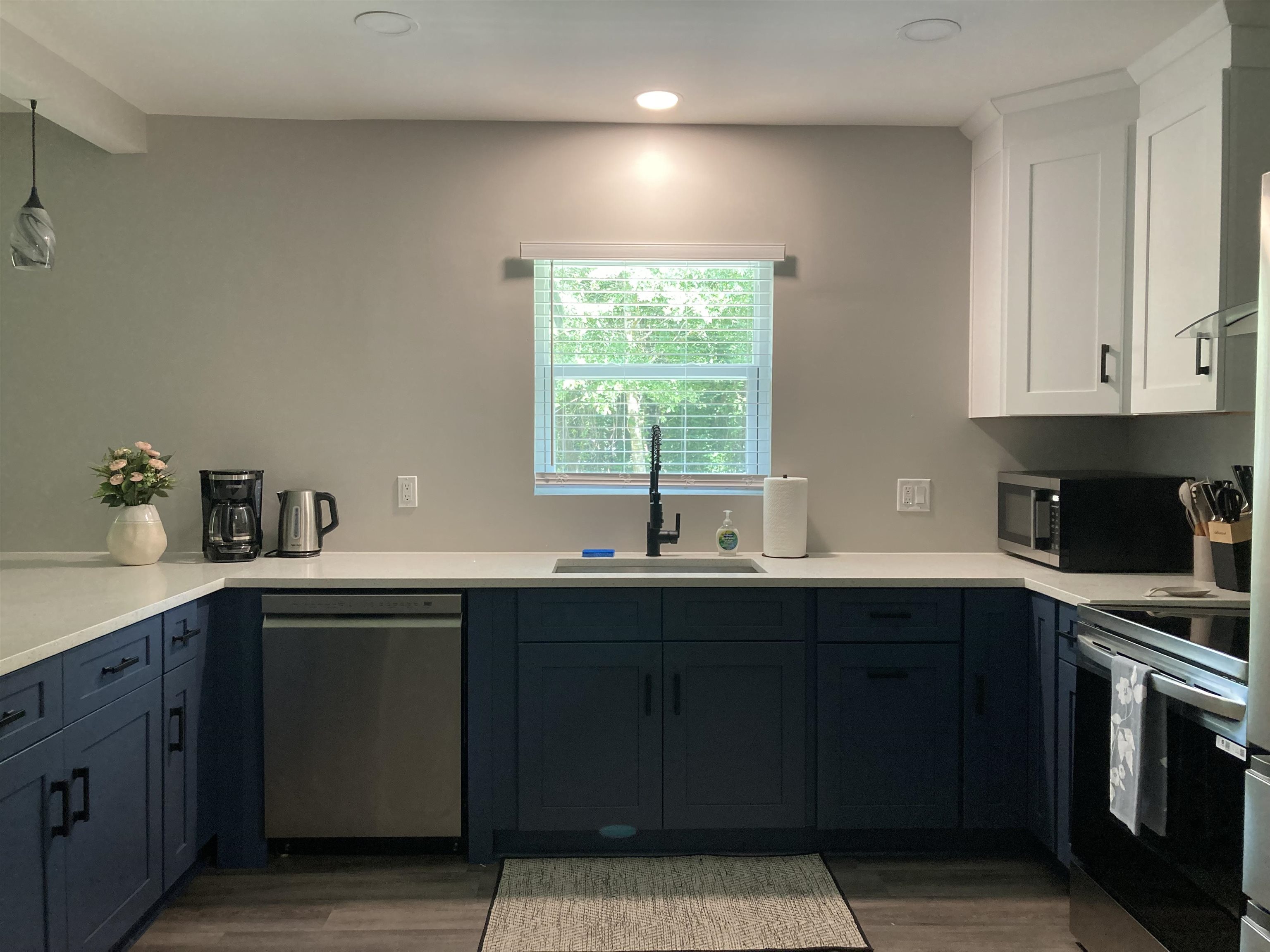 5200 Choctaw Street St. Augustine, FL 32092 - Photo 6 of 29 a kitchen with a sink stove and cabinets