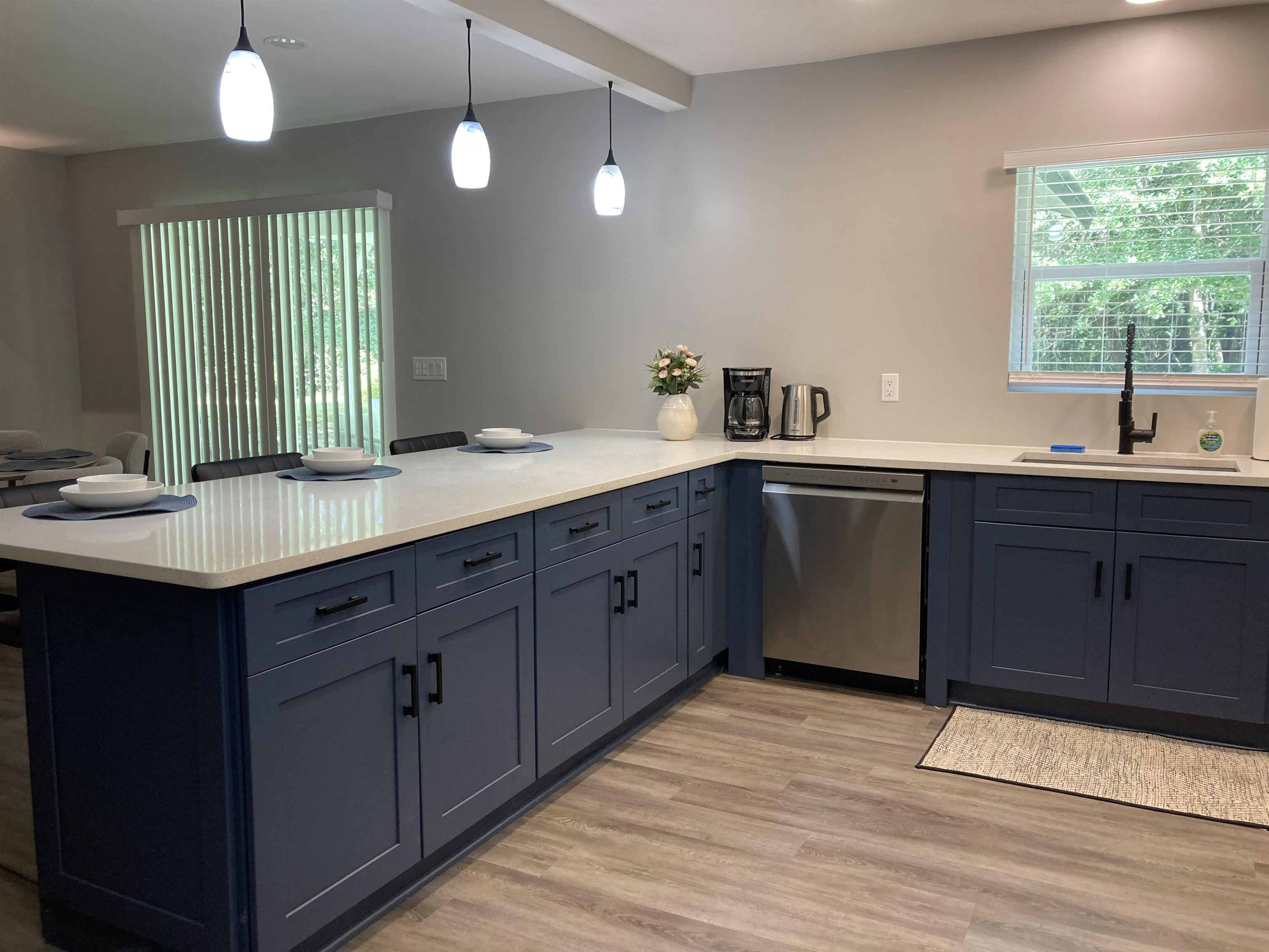 5200 Choctaw Street St. Augustine, FL 32092 - Photo 7 of 29 a kitchen with a sink cabinets and window