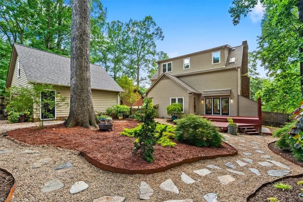 1608 Fox Hollow Road Greensboro, NC 27410 - Photo 33 of 44 Elegantly landscaped backyard
