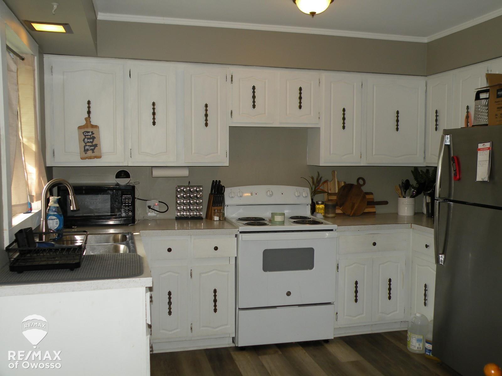 762 Richardson Road Owosso, MI 48867 - Photo 5 of 9 50157086-20b6e9ea-7933-4af0-990c-8afe2cd73279.JPG