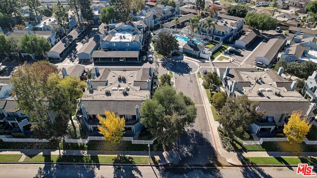 a view of building with seating space and yard