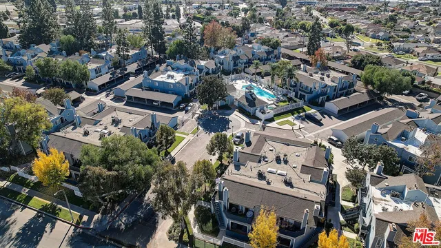 an aerial view of a building with outdoor area