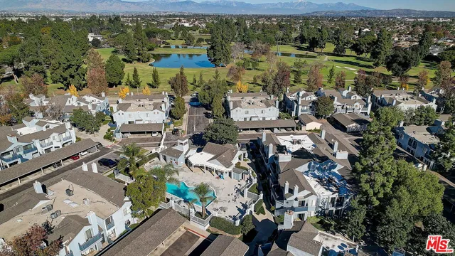 an aerial view of a city with lots of residential buildings