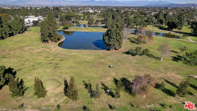 a view of a city with mountains in the background
