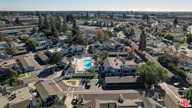 an aerial view of a city with lots of residential buildings