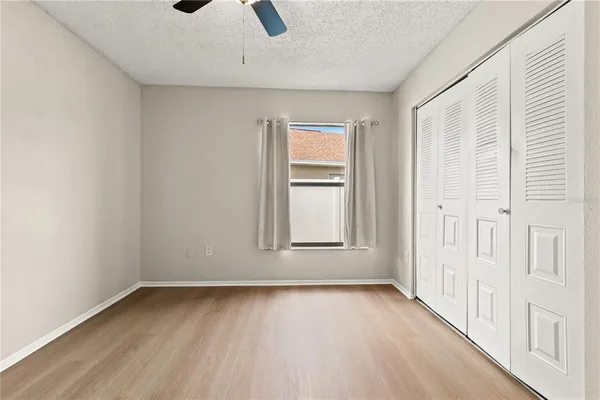 an empty room with a empty space and a window