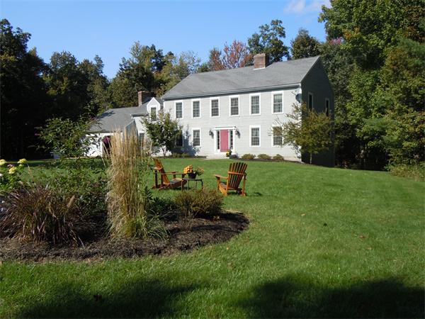 142 Hubbardston Road Princeton, MA 01541 - Photo 1 of 30 a view of a house with a big yard and potted plants