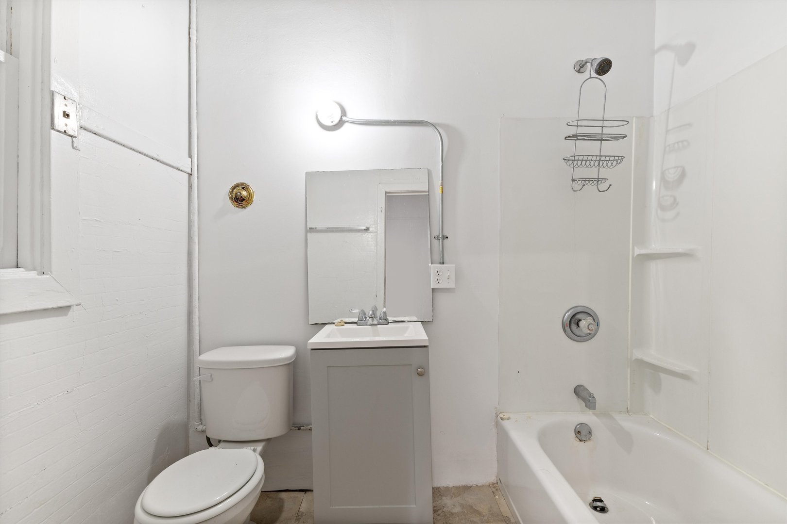 1239 North Dearborn Street Chicago, IL 60610 - Photo 14 of 30 a bathroom with a toilet sink and shower