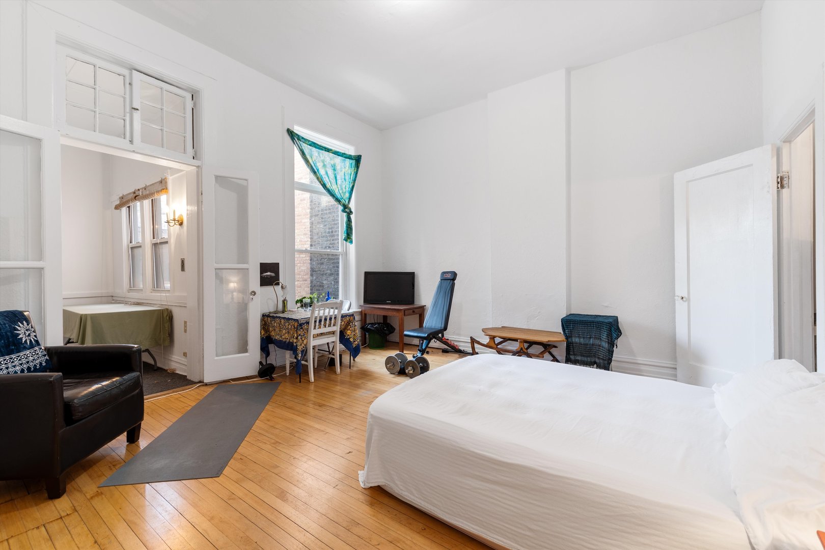 1239 North Dearborn Street Chicago, IL 60610 - Photo 8 of 30 a bedroom with furniture and a large window