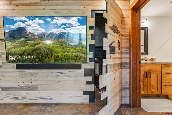 a view of a balcony with wooden floor