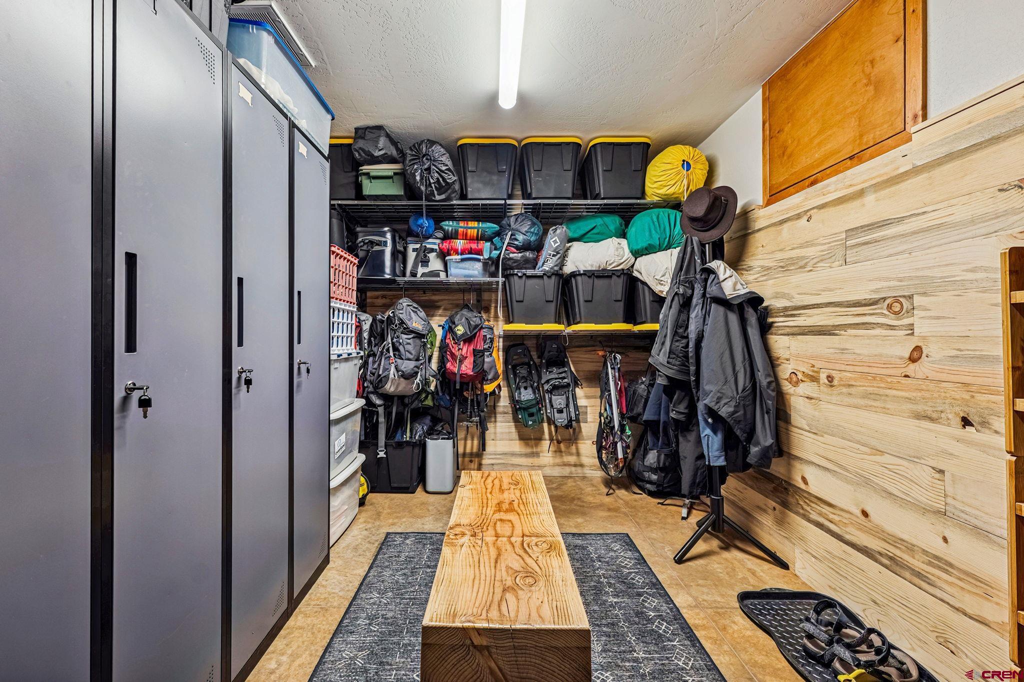 1022 Twin Buttes Avenue Durango, CO 81301 - Photo 35 of 45 a view of walk in closet with clothes and shoes