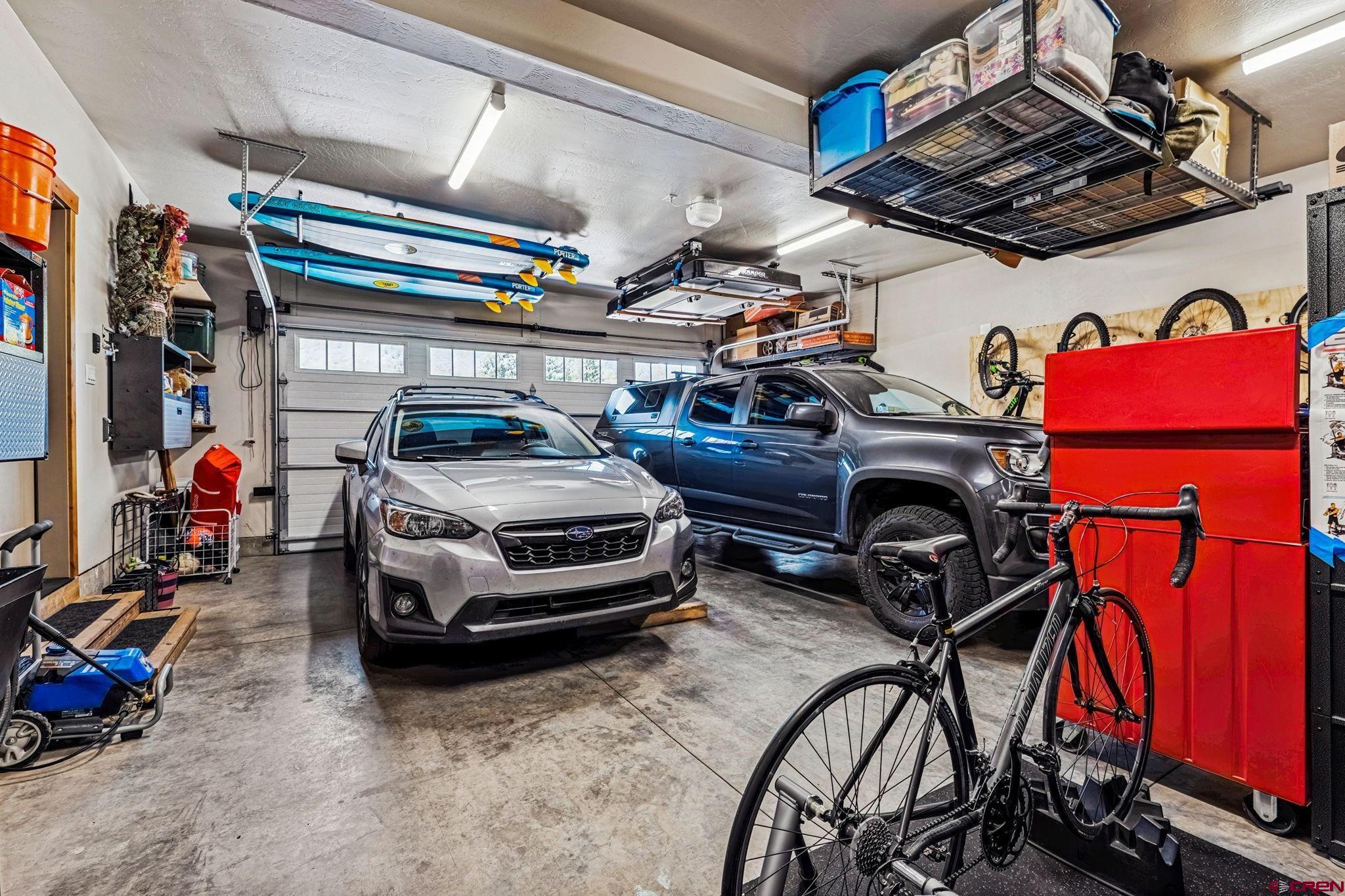 1022 Twin Buttes Avenue Durango, CO 81301 - Photo 36 of 45 a car parked in a garage