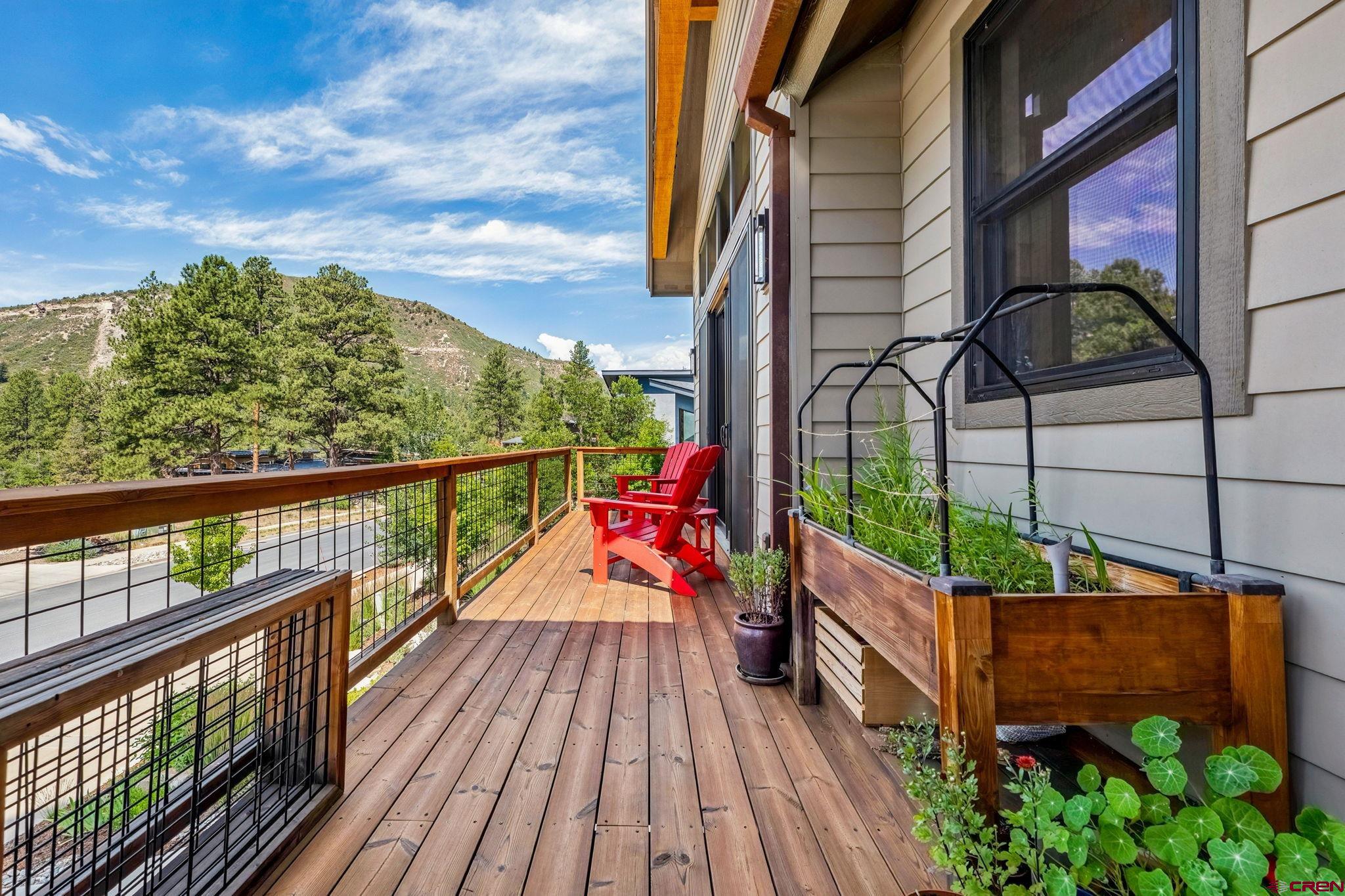 1022 Twin Buttes Avenue Durango, CO 81301 - Photo 40 of 45 a view of balcony with wooden floor