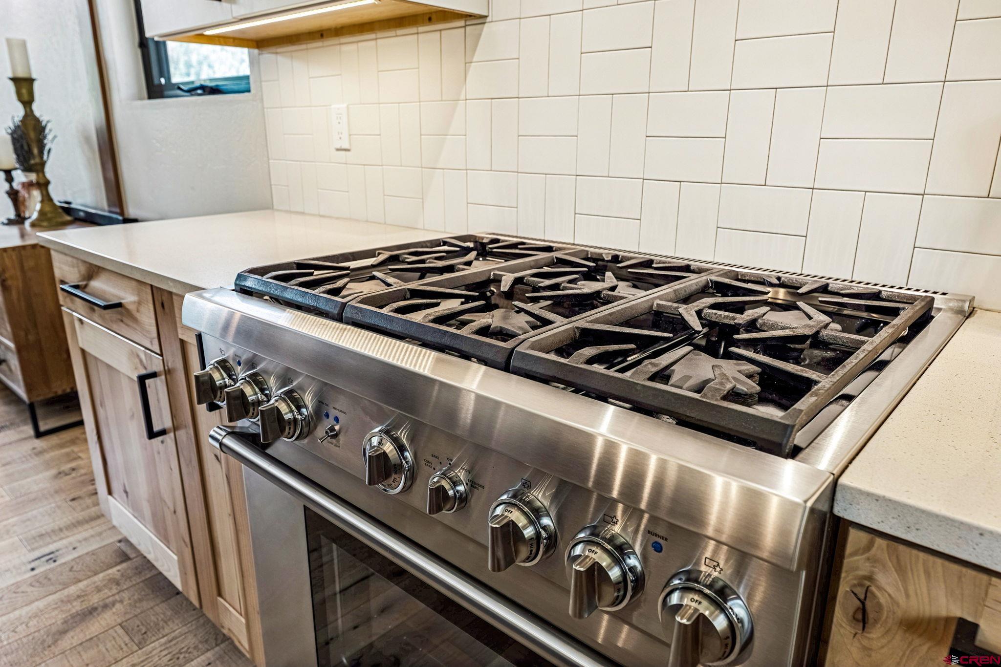 1022 Twin Buttes Avenue Durango, CO 81301 - Photo 8 of 45 a close view of a stove top oven