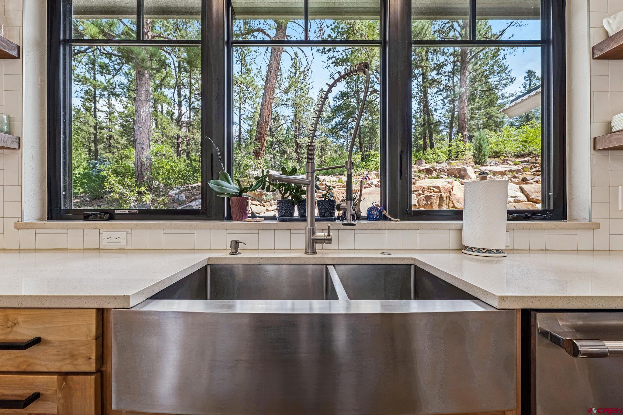 1022 Twin Buttes Avenue Durango, CO 81301 - Photo 10 of 45 a view that has a sink and glass window
