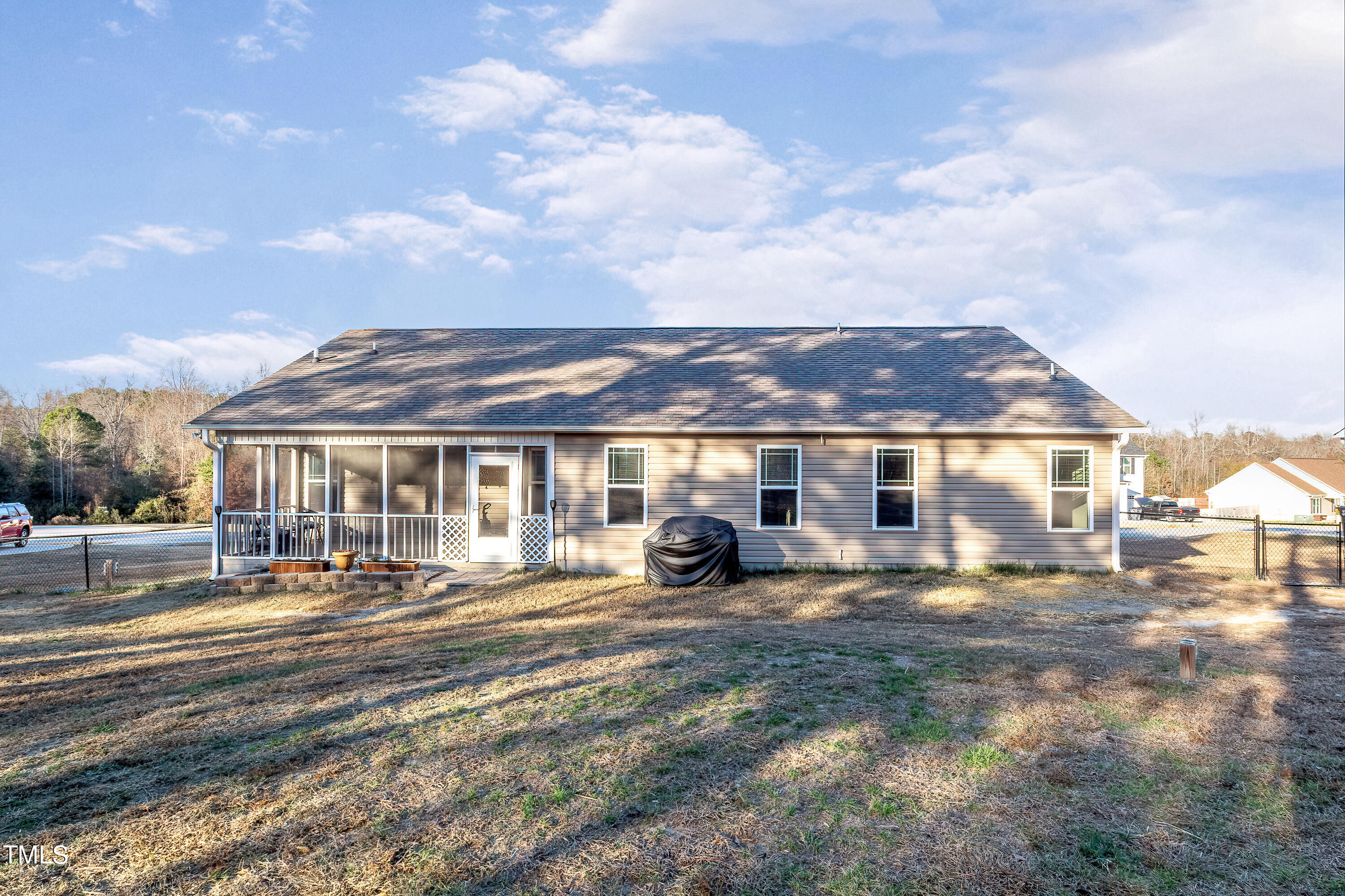 235 Highcroft Circle Benson, NC 27504 - Photo 24 of 25 a front view of a house with a yard