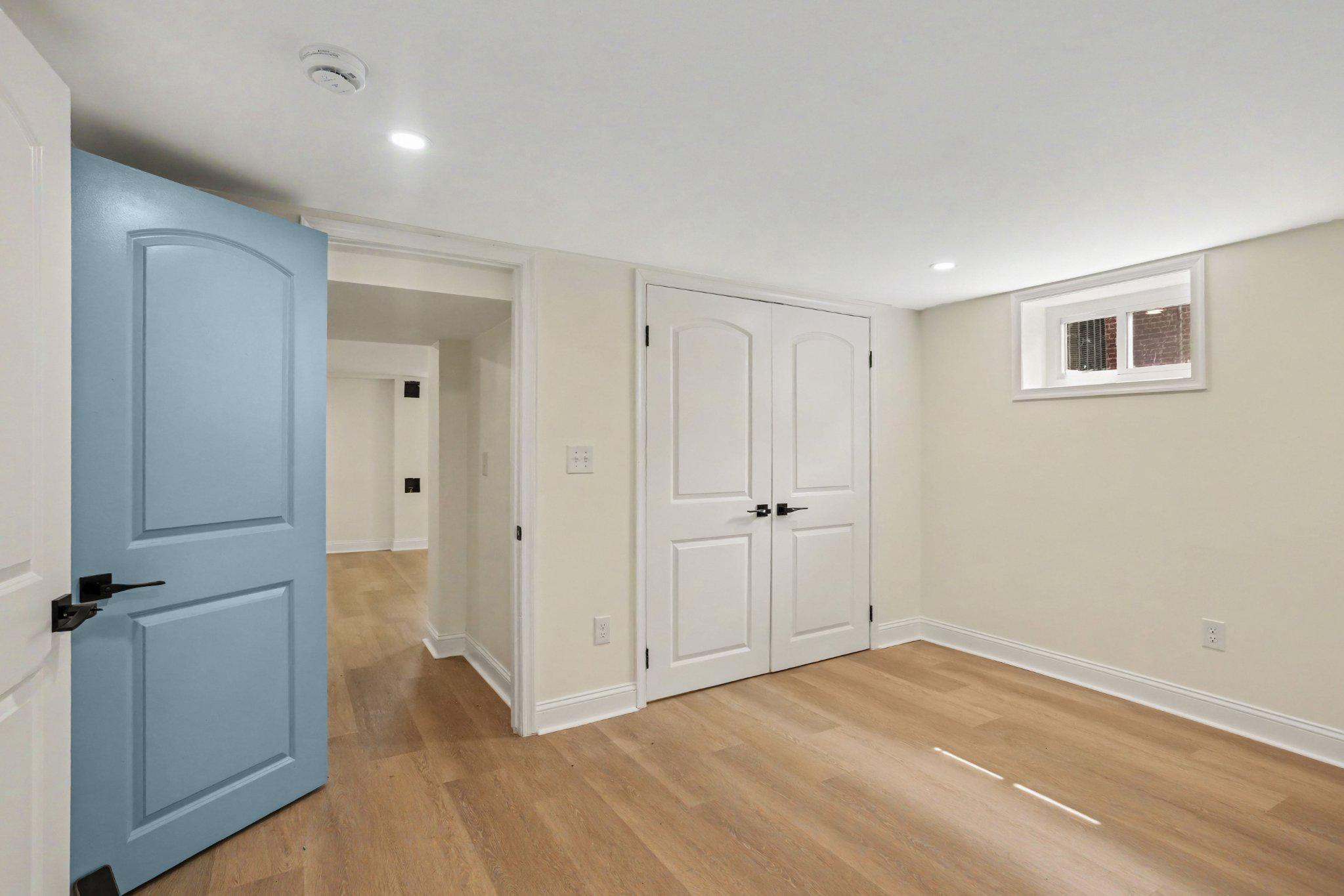 1635 Walterswood Road Baltimore, MD 21239 - Photo 22 of 33 4th Bedroom in basement w/large closet viewing out