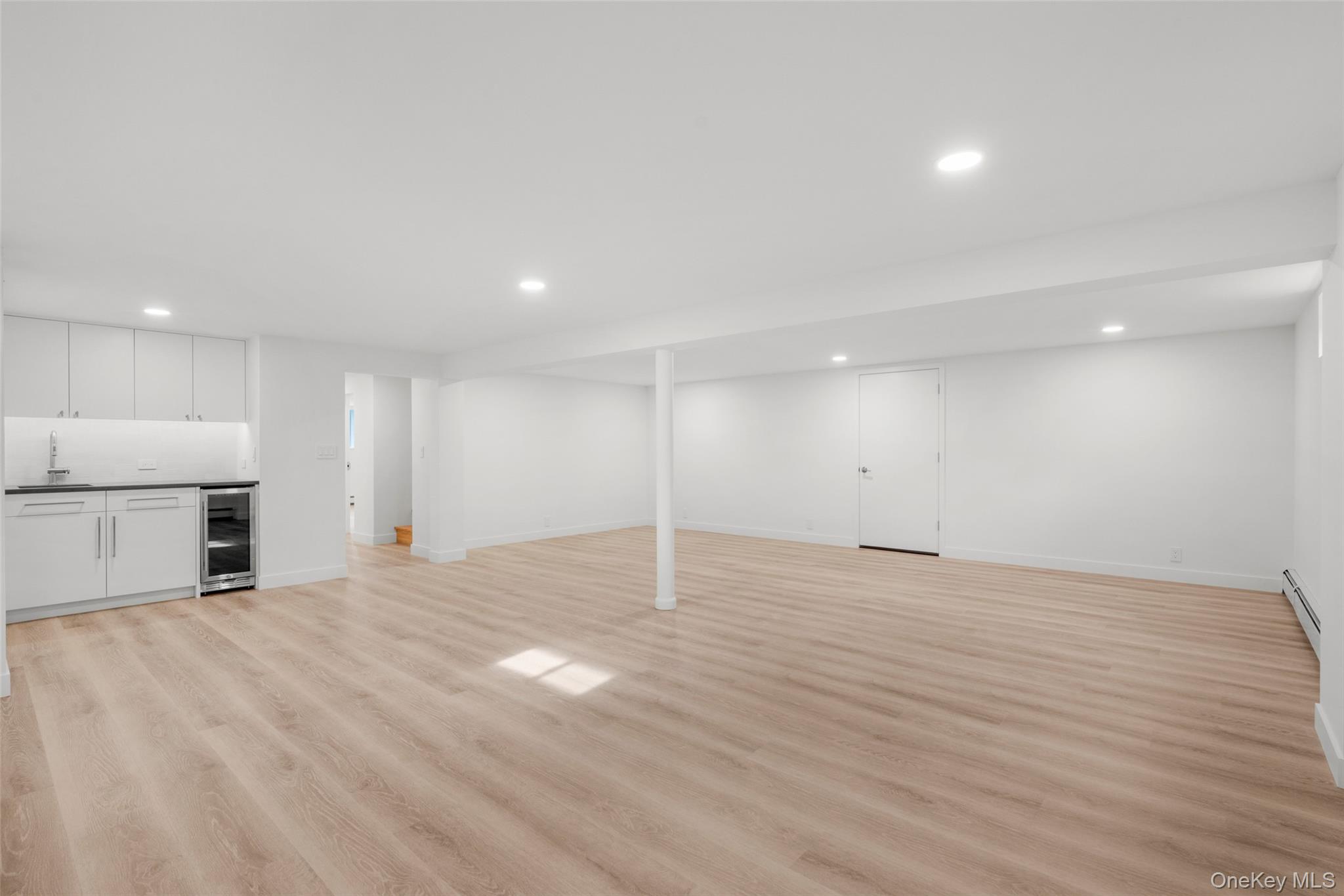 1 Craigside Drive Cold Spring, NY 10516 - Photo 20 of 36 Finished basement with wet bar and engineered wood floors