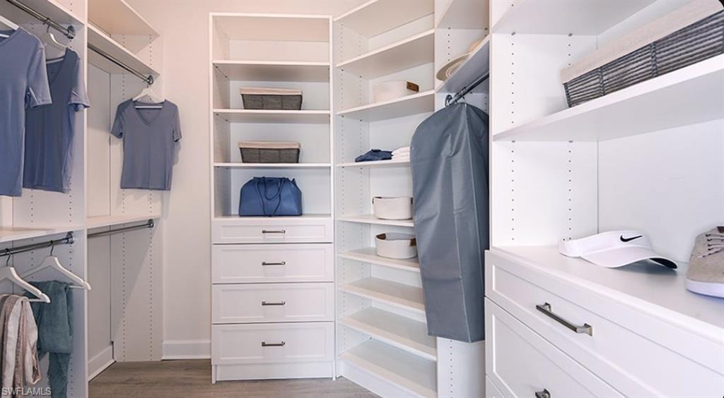 12701 Bellissimo Fort Myers, FL 33913 - Photo 13 of 34 a view of walk in closet and bedroom
