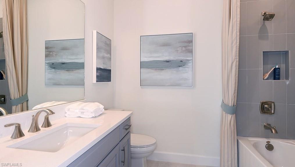 12701 Bellissimo Fort Myers, FL 33913 - Photo 15 of 34 a bathroom with a sink toilet and shower