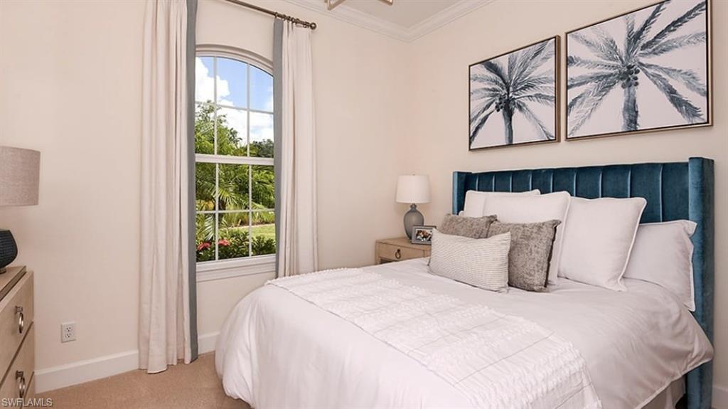 12701 Bellissimo Fort Myers, FL 33913 - Photo 18 of 34 a bedroom with a bed and a window