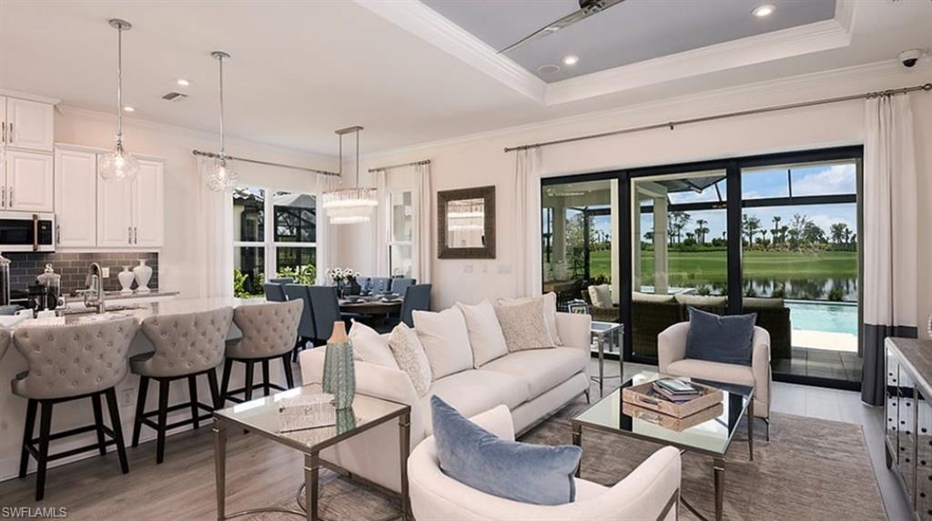 12701 Bellissimo Fort Myers, FL 33913 - Photo 5 of 34 a living room with furniture and a large window