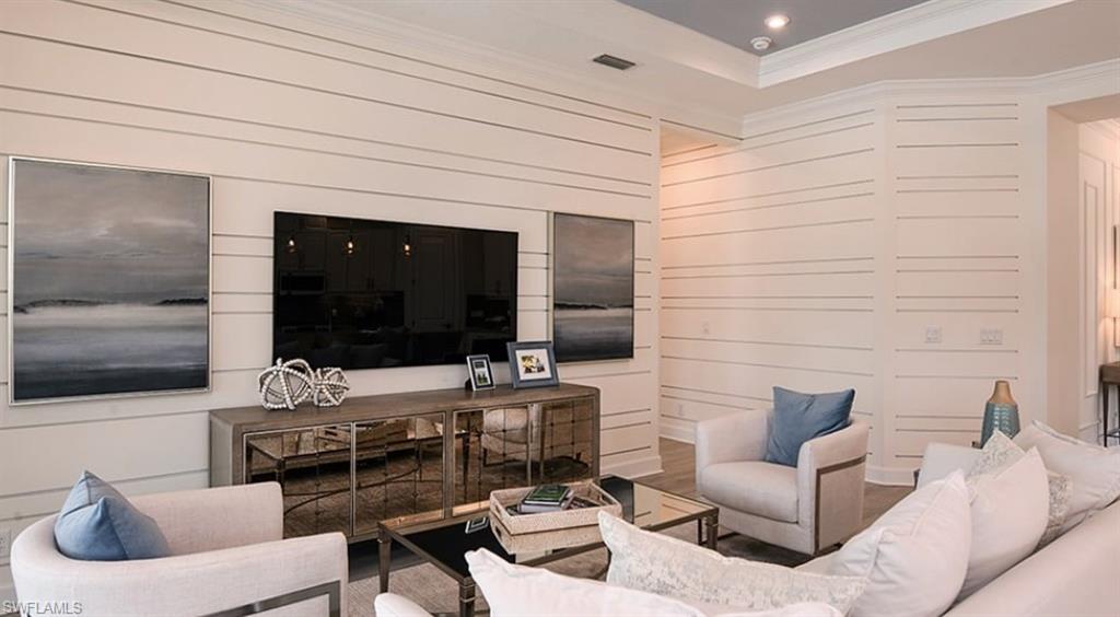 12701 Bellissimo Fort Myers, FL 33913 - Photo 10 of 34 a living room with furniture and a flat screen tv