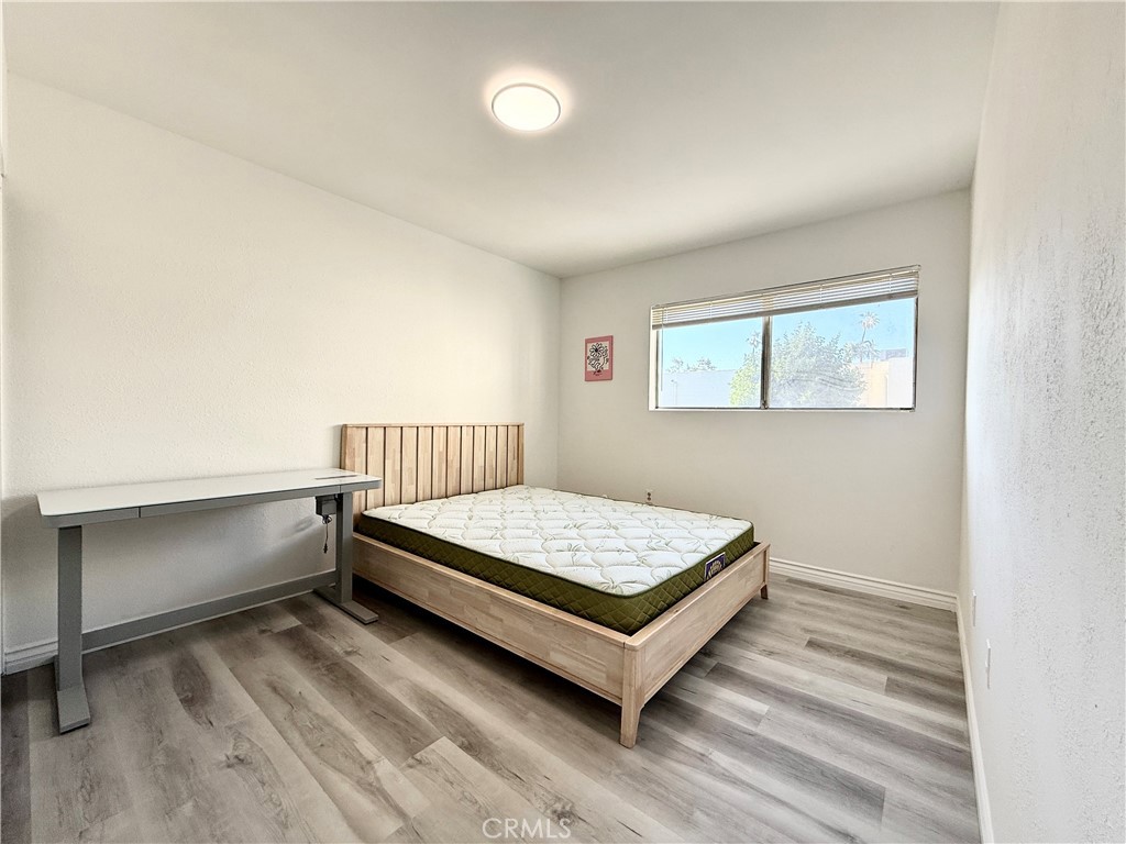 1415 Everton Place Riverside, CA 92507 - Photo 19 of 24 a bedroom with a bed and window